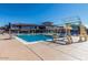 Community pool with diving boards and chairs, perfect for summer fun at 4516 W Fortune Dr, Phoenix, AZ 85086