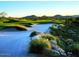 Scenic golf course with rolling hills, sand traps and mountain views at 4516 W Fortune Dr, Phoenix, AZ 85086