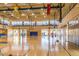 Spacious gymnasium with basketball hoops and sports flooring, perfect for active residents at 4516 W Fortune Dr, Phoenix, AZ 85086
