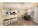 Open kitchen and dining area with granite countertops and stylish decor at 4516 W Fortune Dr, Phoenix, AZ 85086
