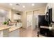 Bright kitchen featuring white cabinets and granite countertops at 4516 W Fortune Dr, Phoenix, AZ 85086
