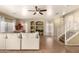 Spacious living room featuring a large sofa and built in shelving at 4516 W Fortune Dr, Phoenix, AZ 85086