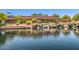 Scenic pond featuring a charming gazebo and rock waterfall, creating a tranquil atmosphere at 4516 W Fortune Dr, Phoenix, AZ 85086