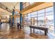 Spacious recreation center with large windows overlooking the pool area at 4516 W Fortune Dr, Phoenix, AZ 85086