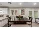 Open concept dining area featuring a modern table set and bright, neutral decor at 4549 W Poinsettia Dr, Glendale, AZ 85304