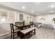 Eat-in dining area features a modern table set, recessed lighting, and access to other living spaces at 4549 W Poinsettia Dr, Glendale, AZ 85304