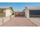 A large fenced driveway leading to an attached garage and back alley access at 4549 W Poinsettia Dr, Glendale, AZ 85304