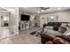 Open living room showcasing tile floors, recessed lighting, and access to other living spaces at 4549 W Poinsettia Dr, Glendale, AZ 85304