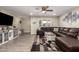Relaxing Gathering room featuring modern tile floors, recessed lighting, and neutral paint palette at 4549 W Poinsettia Dr, Glendale, AZ 85304