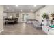 Open concept living space features tile floors, neutral paint, and lots of natural light at 4549 W Poinsettia Dr, Glendale, AZ 85304