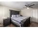 Comfortable bedroom with a spacious bed, soft carpet, and ample natural light, creating a peaceful retreat at 4549 W Poinsettia Dr, Glendale, AZ 85304