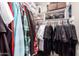 Walk-in closet with ample shelving, organized with clothing and accessories for maximum storage at 4549 W Poinsettia Dr, Glendale, AZ 85304