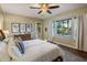 Bright main bedroom with large window and a scenic view, creating a serene and comfortable retreat at 4822 N Barranco Dr, Litchfield Park, AZ 85340