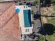 Aerial shot of backyard swimming pool and patio area in a landscaped backyard at 4822 N Barranco Dr, Litchfield Park, AZ 85340