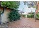 Brick patio with plants and trees at 6120 N 30Th Ave, Phoenix, AZ 85017