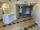 Open concept living room and kitchen area with tile flooring at 6120 N 30Th Ave, Phoenix, AZ 85017