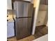 Stainless steel refrigerator in a renovated kitchen with new laminate floors at 6120 N 30Th Ave, Phoenix, AZ 85017