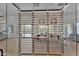 Bright dining room with a decorative wine rack and a view to the patio at 6184 E Dusty Coyote Cir, Scottsdale, AZ 85266