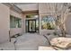 Inviting home entrance with stone walkway and desert-style landscaping at 6184 E Dusty Coyote Cir, Scottsdale, AZ 85266