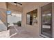 Covered patio with flagstone flooring and a ceiling fan at 6184 E Dusty Coyote Cir, Scottsdale, AZ 85266