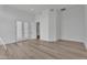 Bright, spacious room with wood floors and French doors leading to the outside at 6184 E Dusty Coyote Cir, Scottsdale, AZ 85266