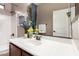 Bathroom showcasing a white vanity, a sink, a framed mirror, and decor at 6202 E Mckellips Rd # 183, Mesa, AZ 85215