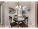 Charming breakfast nook with a chandelier and bright window at 6202 E Mckellips Rd # 183, Mesa, AZ 85215