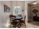 Charming breakfast nook with a chandelier and bright window at 6202 E Mckellips Rd # 183, Mesa, AZ 85215