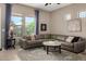 Comfortable living room with ample natural light and neutral tones at 6202 E Mckellips Rd # 183, Mesa, AZ 85215