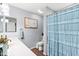 Updated bathroom featuring modern fixtures and a shower-tub combo at 6219 N 22Nd Dr, Phoenix, AZ 85015