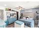 Stylishly decorated bedroom features a large tufted headboard and built in storage at 6219 N 22Nd Dr, Phoenix, AZ 85015