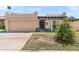 Charming single-story home featuring a two-car garage and mature landscaping in a well-kept front yard at 6219 N 22Nd Dr, Phoenix, AZ 85015