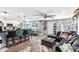 Spacious living area with modern decor, seamlessly connecting the kitchen, dining, and living spaces for versatile use at 6219 N 22Nd Dr, Phoenix, AZ 85015