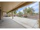 Large covered back patio with view of landscaped backyard, perfect for outdoor living and entertaining at 637 E Settlers Trl, Casa Grande, AZ 85122