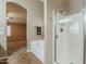 Bathroom showcasing a soaking tub, glass shower, and tiled flooring at 637 E Settlers Trl, Casa Grande, AZ 85122