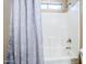 Bathroom featuring a combination shower and tub with tiled walls at 637 E Settlers Trl, Casa Grande, AZ 85122