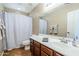 Bathroom vanity featuring a sink, tile flooring, and white shower curtain at 637 E Settlers Trl, Casa Grande, AZ 85122