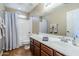 Bathroom vanity featuring a sink, tile flooring, and white shower curtain at 637 E Settlers Trl, Casa Grande, AZ 85122