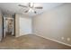 Bedroom features carpet and a large closet with white doors at 637 E Settlers Trl, Casa Grande, AZ 85122