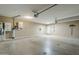 Spacious garage featuring abundant lighting and a door to the house at 637 E Settlers Trl, Casa Grande, AZ 85122