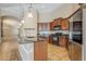 Well-appointed kitchen with a large island featuring pendant lighting and modern appliances at 637 E Settlers Trl, Casa Grande, AZ 85122