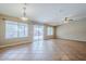 Living room with lots of natural light, tile flooring, and access to the backyard patio at 637 E Settlers Trl, Casa Grande, AZ 85122