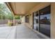 Covered patio with sliding glass doors that open to the backyard at 637 E Settlers Trl, Casa Grande, AZ 85122