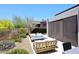 Relaxing backyard space with comfortable seating and beautiful landscaping at 6939 E Bramble Berry Ln, Scottsdale, AZ 85266