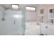 Spacious bathroom with a tiled shower and a separate soaking tub at 6939 E Bramble Berry Ln, Scottsdale, AZ 85266