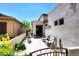 Cozy courtyard patio features an outdoor seating arrangement at 6939 E Bramble Berry Ln, Scottsdale, AZ 85266