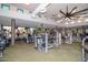 Community fitness center with modern equipment and large windows for scenic views at 6939 E Bramble Berry Ln, Scottsdale, AZ 85266
