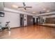 Community gym with boxing equipment, mirrors, and exercise bike on a wooden floor at 6939 E Bramble Berry Ln, Scottsdale, AZ 85266