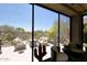 Inviting patio with comfortable seating and views of the desert landscape at 6939 E Bramble Berry Ln, Scottsdale, AZ 85266