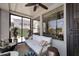Inviting sunroom featuring a comfortable seating area and great views of the outdoors at 6939 E Bramble Berry Ln, Scottsdale, AZ 85266